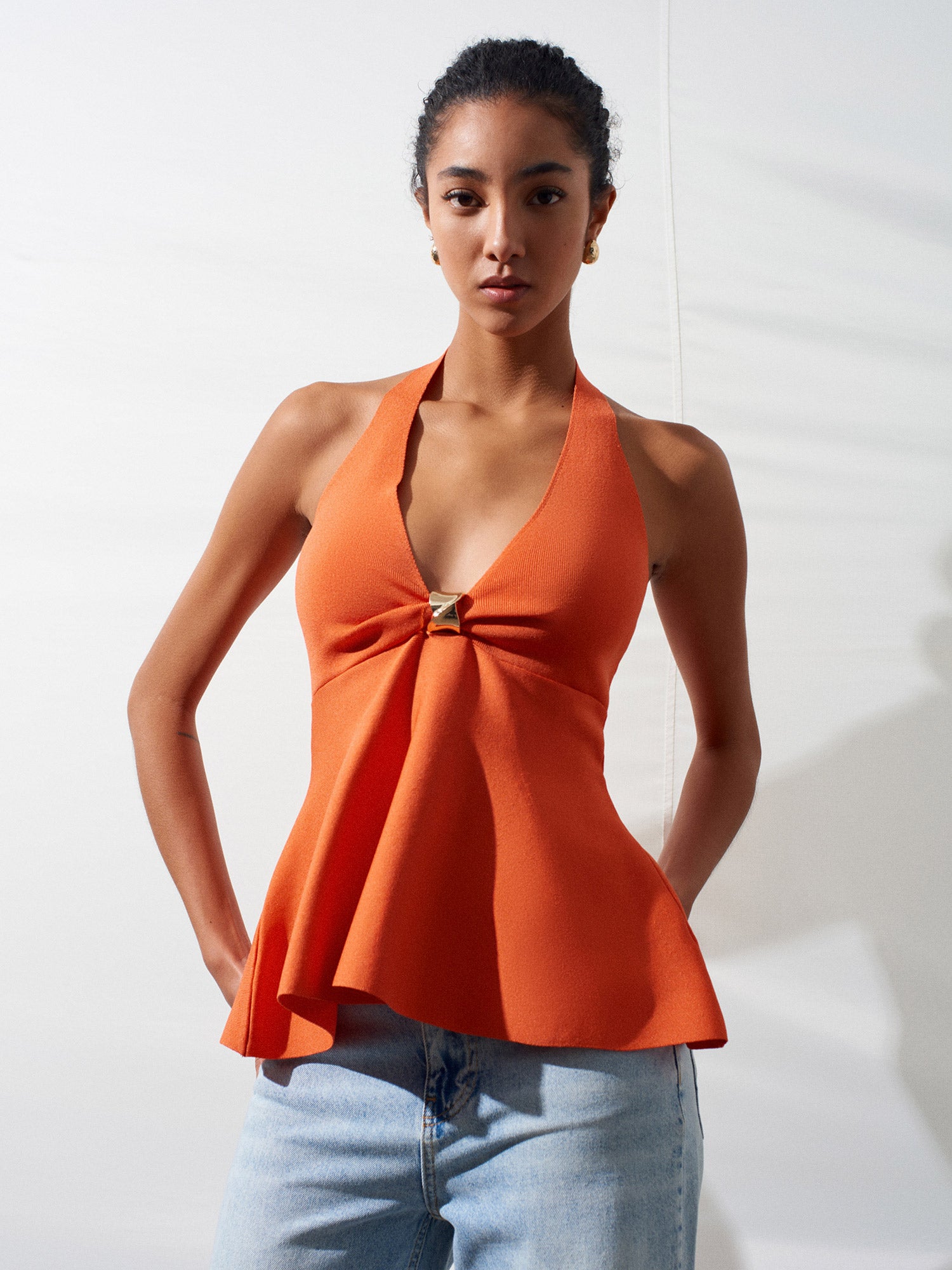 Peplumtopp i Stickat med Halterneck – Orange