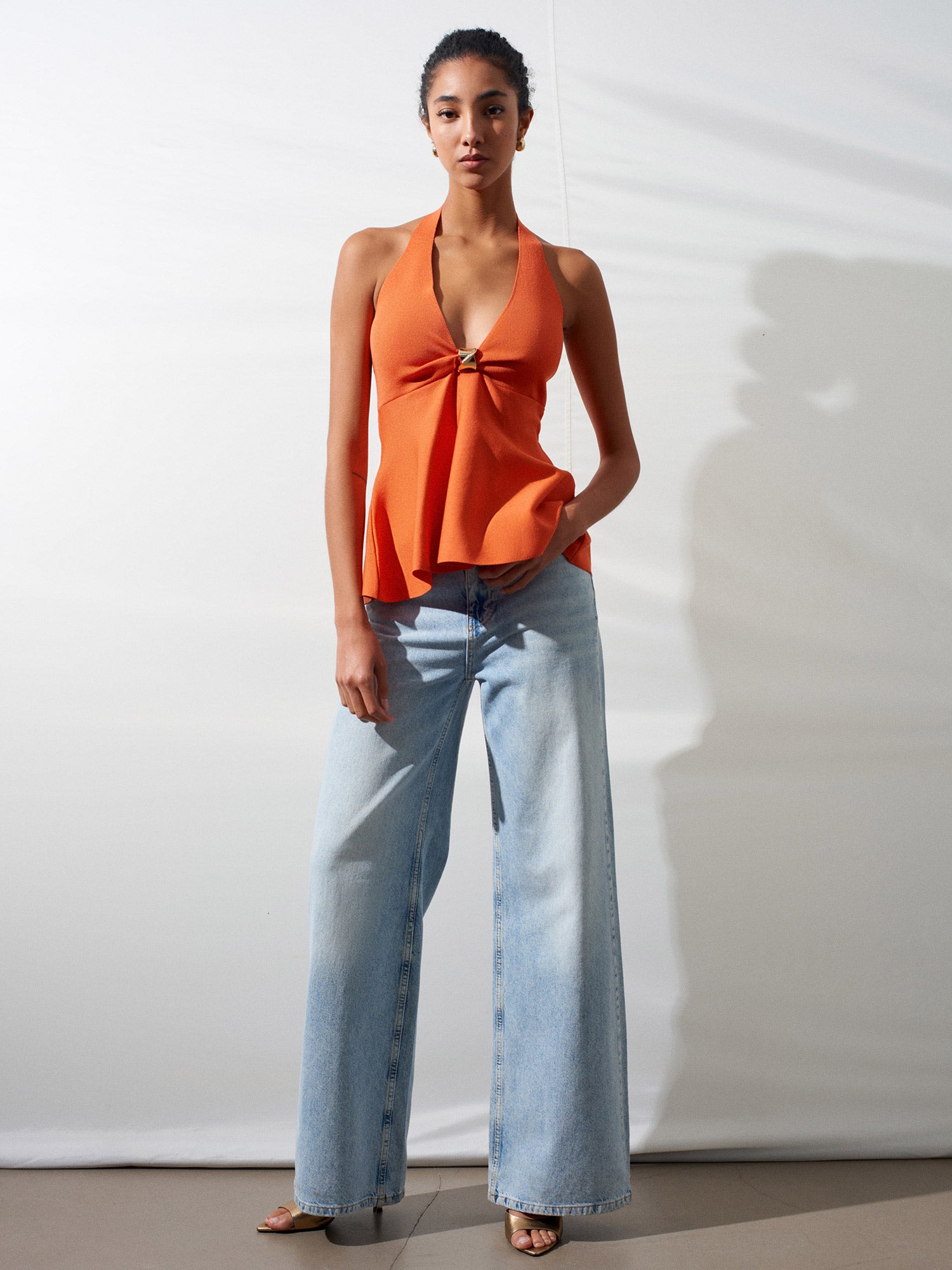 Peplumtopp i Stickat med Halterneck – Orange