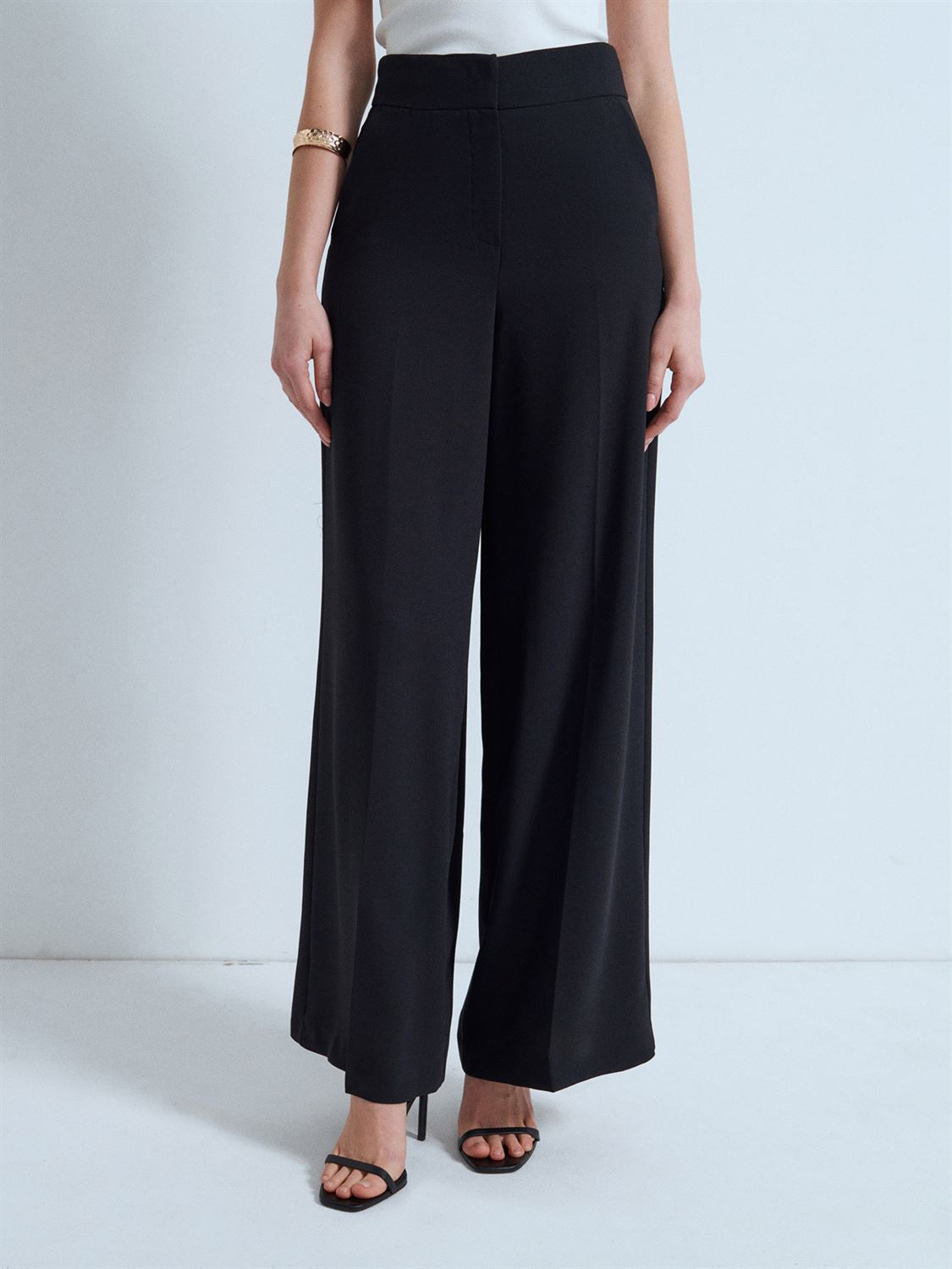 Högmidjade wide leg-byxor - Svart