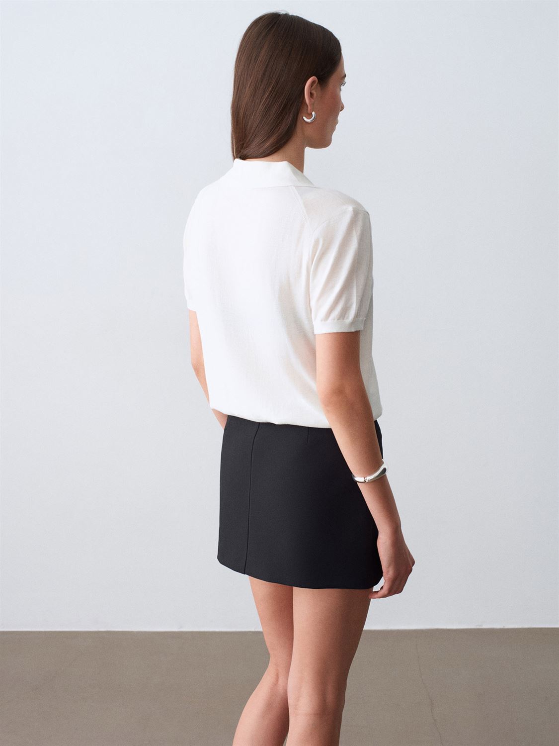 Mini skort med spänne - Svart