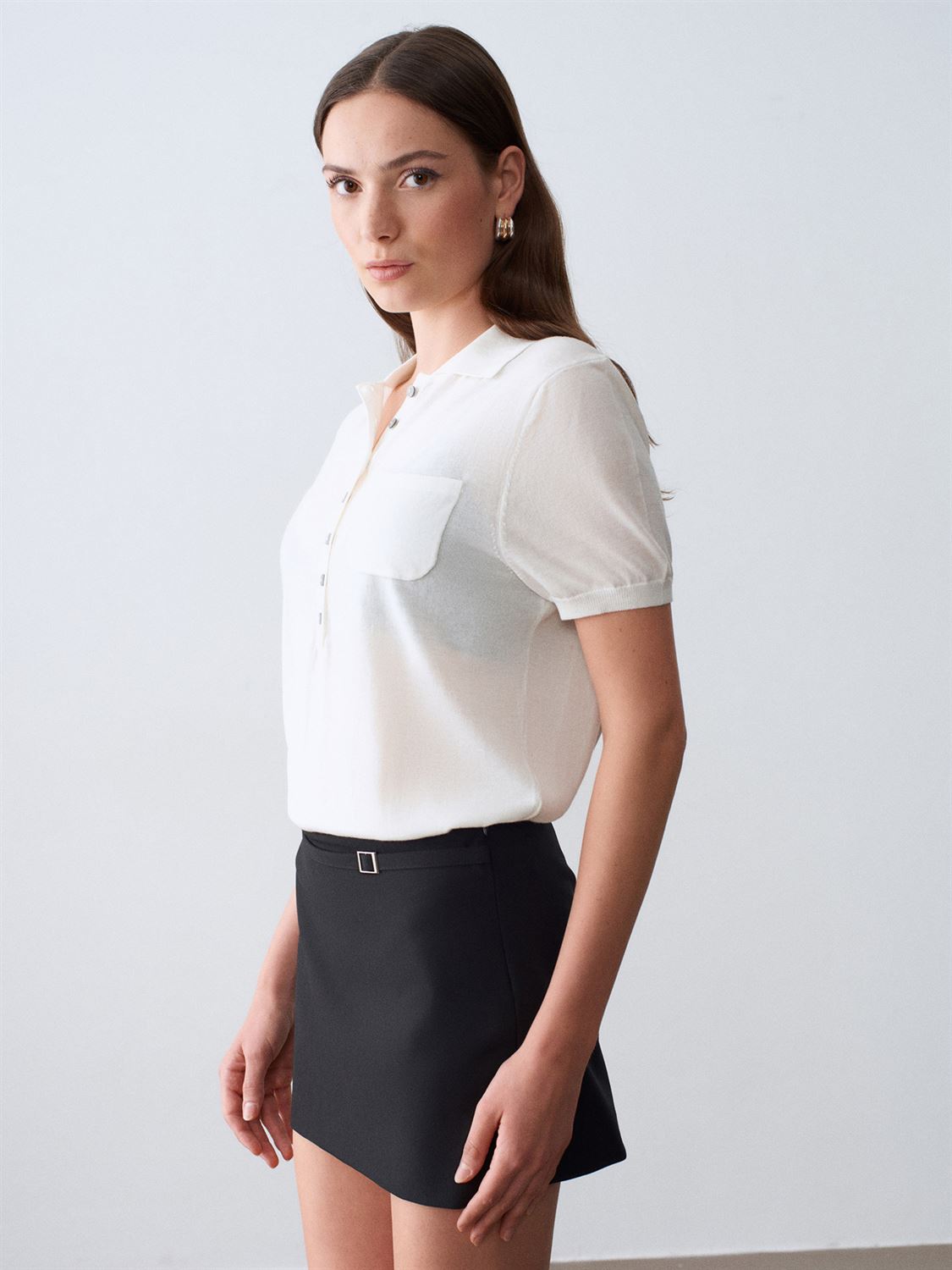 Mini skort med spänne - Svart