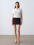 Mini skort med spänne - Svart