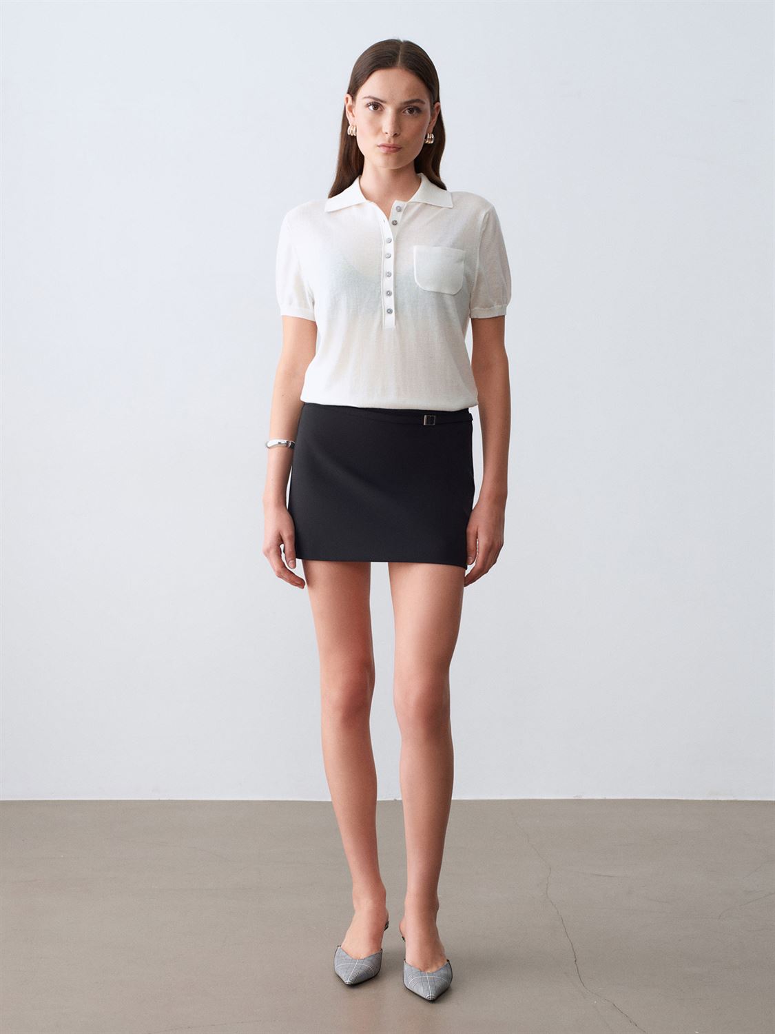 Mini skort med spänne - Svart